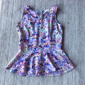 Floral print peplum sleeveless blouse
